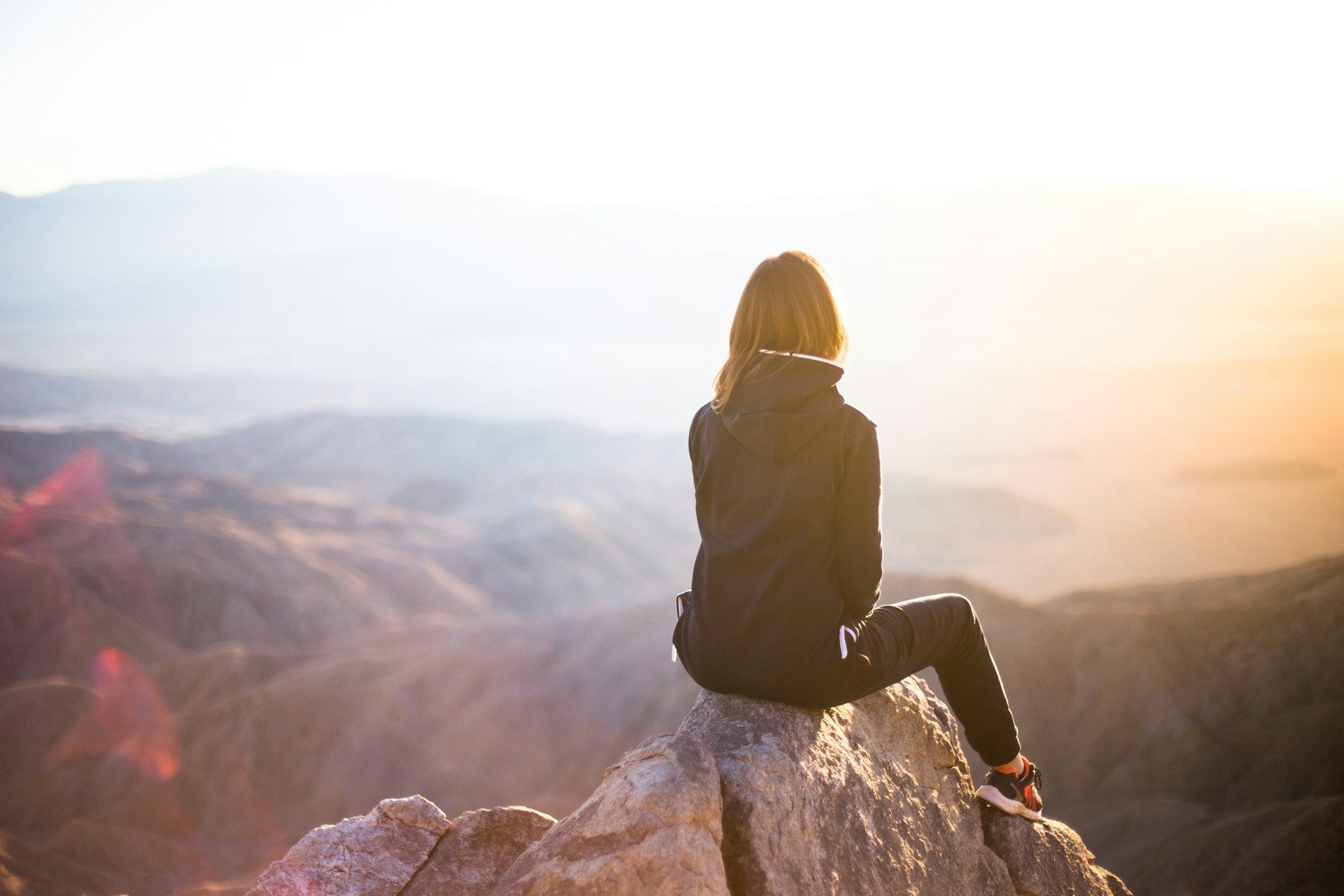 A woman sitting in reflection